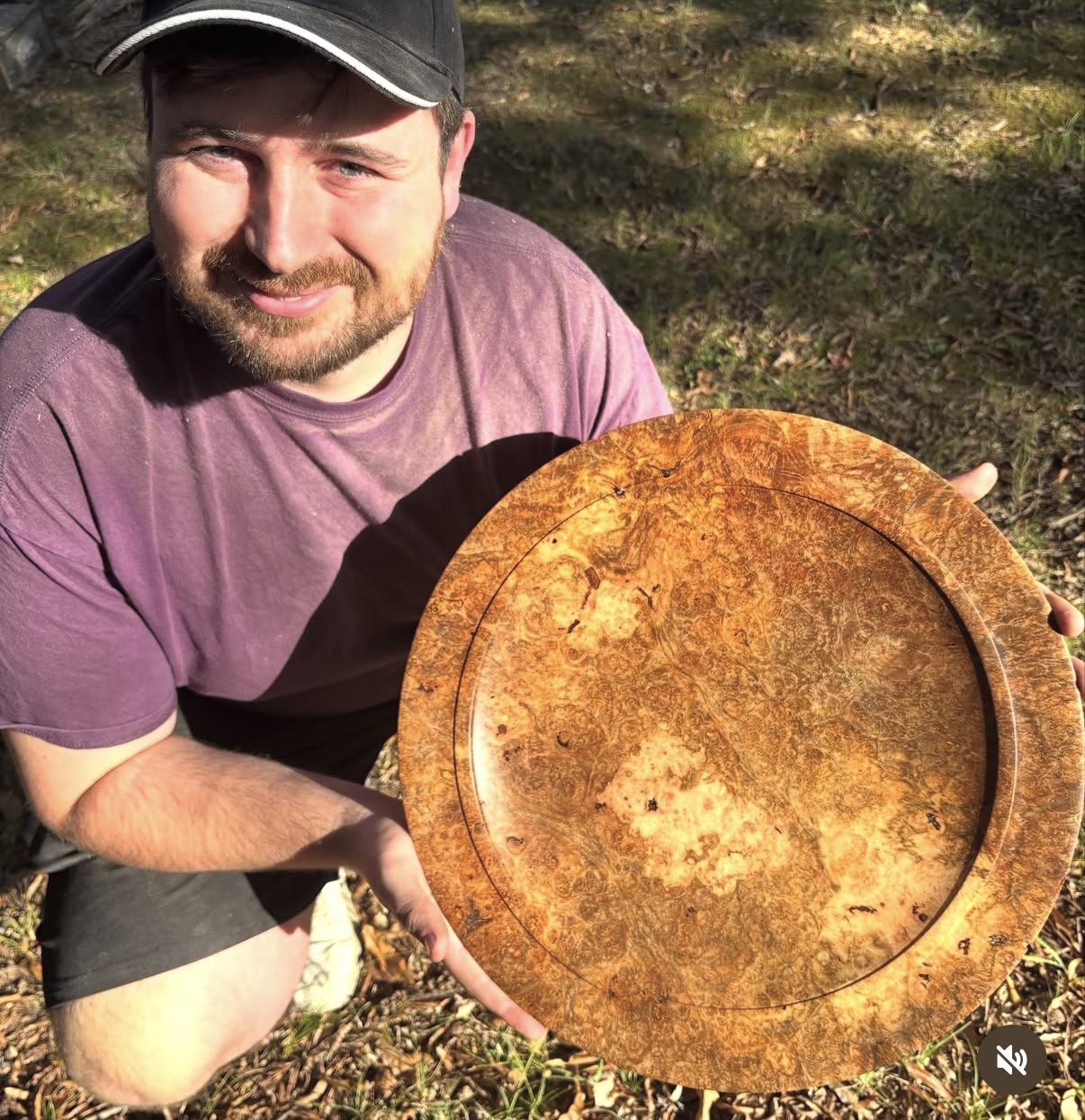 Matthew Coleman with a maple burl platter